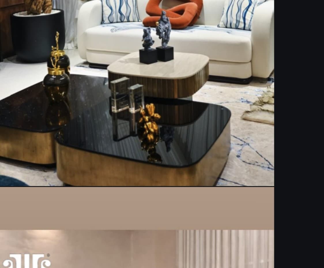 Noor nesting coffee tables with black glass tops and brass bases